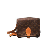 Louis Vuitton "Cartouchiere MM Monogram Canvas"