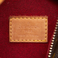 Louis Vuitton Croissant Canvas in Brown