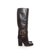 Gucci Black leather boots with gold buckles 