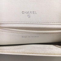 Chanel clutch with camellia flower