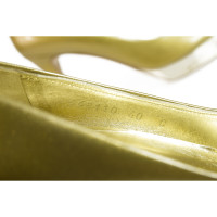 Gucci Talons pointus métalliques dorés