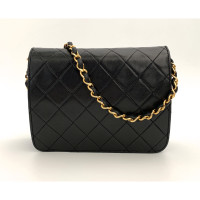 Chanel Petite Timeless aus Leder in Schwarz