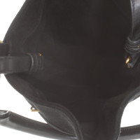 Yves Saint Laurent "Monogram Suede Fringe Bucket Bag"