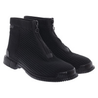 Camper Ankle boots in Black