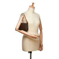 Louis Vuitton Pochette Mini Canvas in Brown