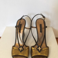 Louis Vuitton Wedges Leather in Gold