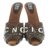 Costume National Wooden mules in brown