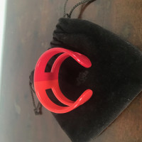 Hermès Armreif/Armband aus Holz in Rot