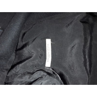 Bottega Veneta Jacke/Mantel aus Wolle in Schwarz