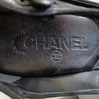 Chanel Pumps/Peeptoes aus Leder in Schwarz