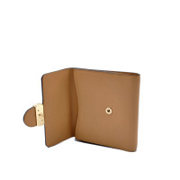 Gucci Accessoire aus Leder in Beige