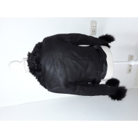 Prada Jacke/Mantel aus Pelz in Schwarz