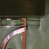 Coccinelle Clutch aus Leder in Grün