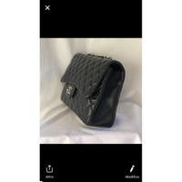 Chanel Sac à bandoulière en Cuir en Noir