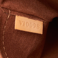 Louis Vuitton Batignolles Vertical Canvas in Brown