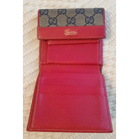 Gucci Täschchen/Portemonnaie aus Leder in Rot