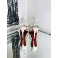 Christian Louboutin Chaussures à lacets en Cuir en Rouge