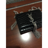 Yves Saint Laurent Clutch en Cuir verni en Noir