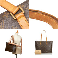 Louis Vuitton Luco Canvas in Brown