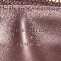 Louis Vuitton Sac à main/Portefeuille en Cuir verni en Bordeaux
