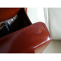 Cartier Handtasche aus Lackleder in Braun