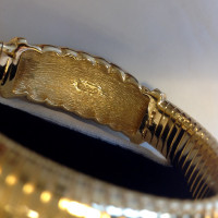 Christian Dior Armreif/Armband goldfarbend
