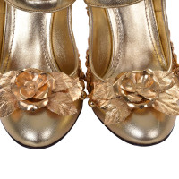 Dolce & Gabbana Pumps/Peeptoes Leather in Gold