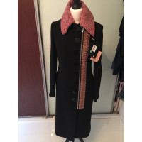 Miu Miu Jacke/Mantel aus Wolle in Schwarz