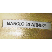 Manolo Blahnik Décolleté/Spuntate in Pelle in Oro