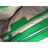 Michael Kors Umhängetasche aus Leder in Grün