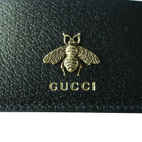 Gucci Accessoire aus Leder in Ocker