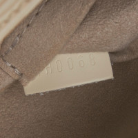 Louis Vuitton Pochette Montaigne in white leather