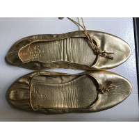 H&M (Designers Collection For H&M) Slippers/Ballerina's Leer in Goud
