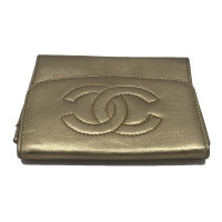 Chanel Täschchen/Portemonnaie aus Leder in Gold