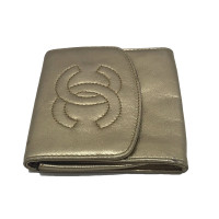 Chanel Täschchen/Portemonnaie aus Leder in Gold