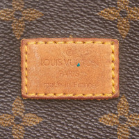 Louis Vuitton Saumur 35 in Tela in Marrone