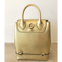 Louis Vuitton Rucksack aus Leder in Gold