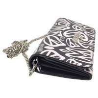 Moschino Printed leather wallet clutch 