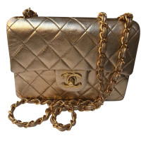 Chanel Classic Flap Bag Mini Square aus Leder in Gold