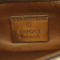 Gucci Goldfarbene Clutch
