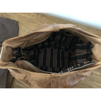 Coccinelle Handtasche aus Leder in Ocker