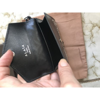 Alaïa Täschchen/Portemonnaie aus Leder in Schwarz