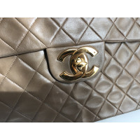 Chanel Classic Flap Bag Maxi Leer in Bruin