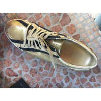 Gucci Sneaker in Pelle verniciata in Oro