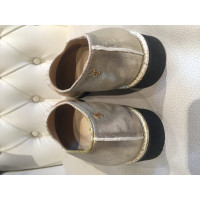 Chanel Chaussons/Ballerines en Cuir en Doré