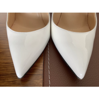 Christian Louboutin Pigalle in Pelle verniciata in Bianco