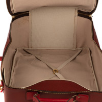 Louis Vuitton Reisetasche aus Leder in Rot