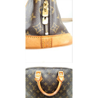 Louis Vuitton Alma PM32 in Tela in Marrone