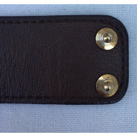 Louis Vuitton Armreif/Armband aus Leder in Braun