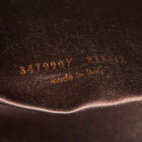 Yves Saint Laurent Clutch aus Leder in Braun
